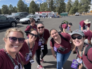 Volunteers smiling at the camera